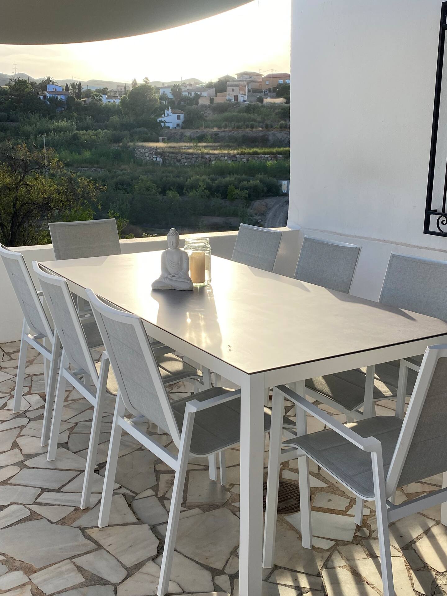 Terrace dining table at sunset